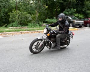 Motorcycle Bikerspeeding down the street in Baltimore